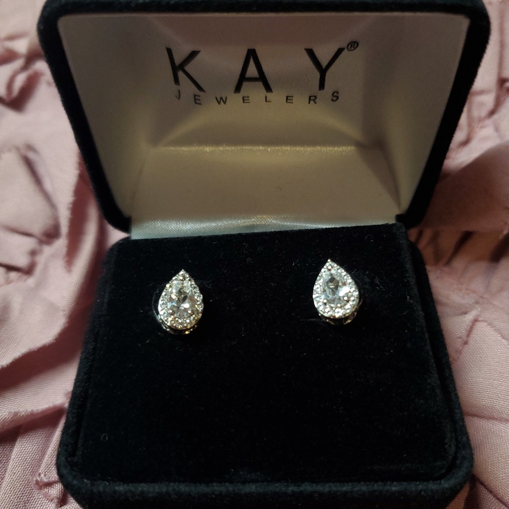 Pear White Topaz with Diamond Accent in Sterling Silver Studs